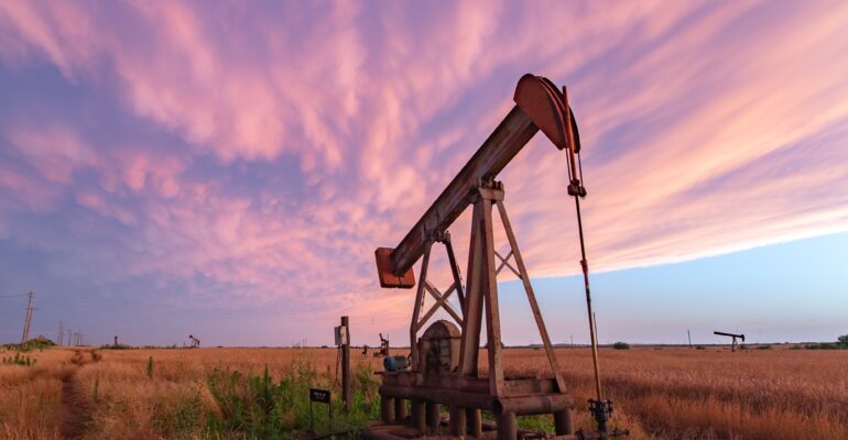 Mammatus clouds behind an oil pumpjack near dusk in Burkburnett, TX back in June